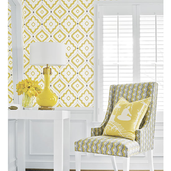 living room with printed walls and flowers in vase