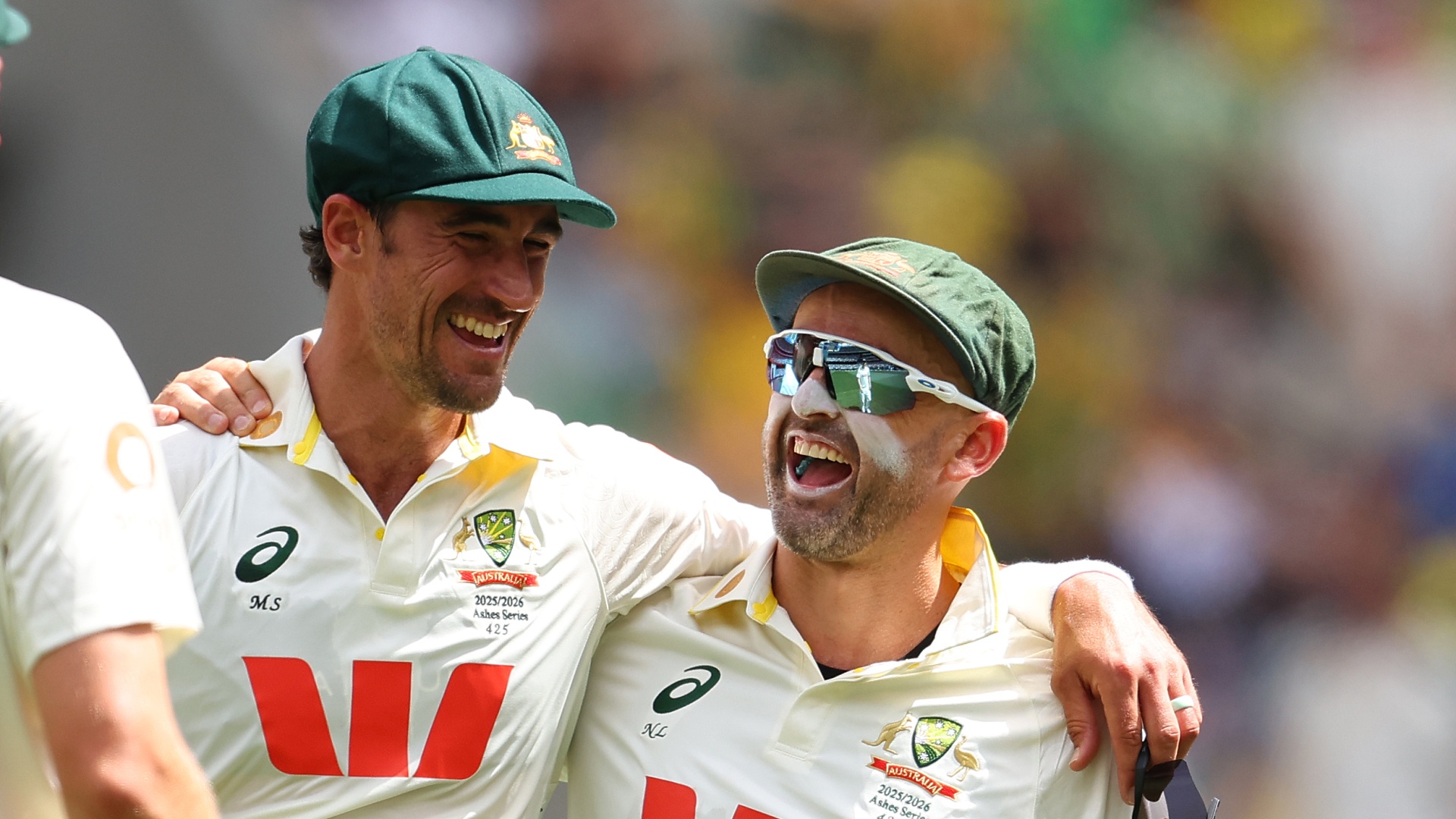 Australia's Mitchell Starc and Nathan Lyon celebrating during The Ashes 2025/26