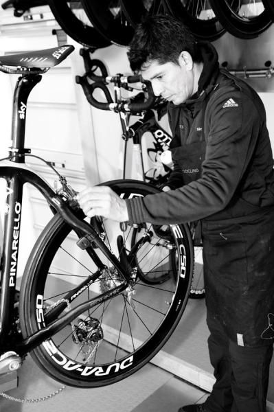 A Team Sky mechanic makes sure that the bike's brakes work perfectly