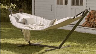 luxury quilted hammock on freestanding frame best outdoor furniture for relaxing