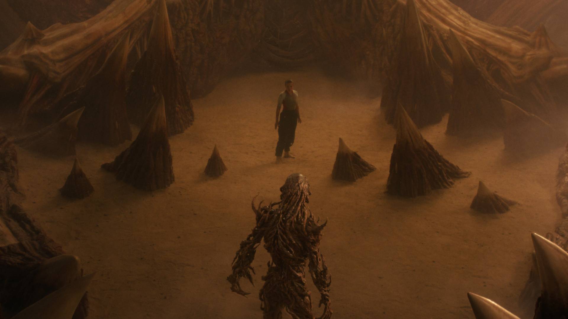 Millie Bobby Brown as Eleven and Jamie Campbell Bower as Vecna face-off in the Abyss in the Stranger Things season 5 finale