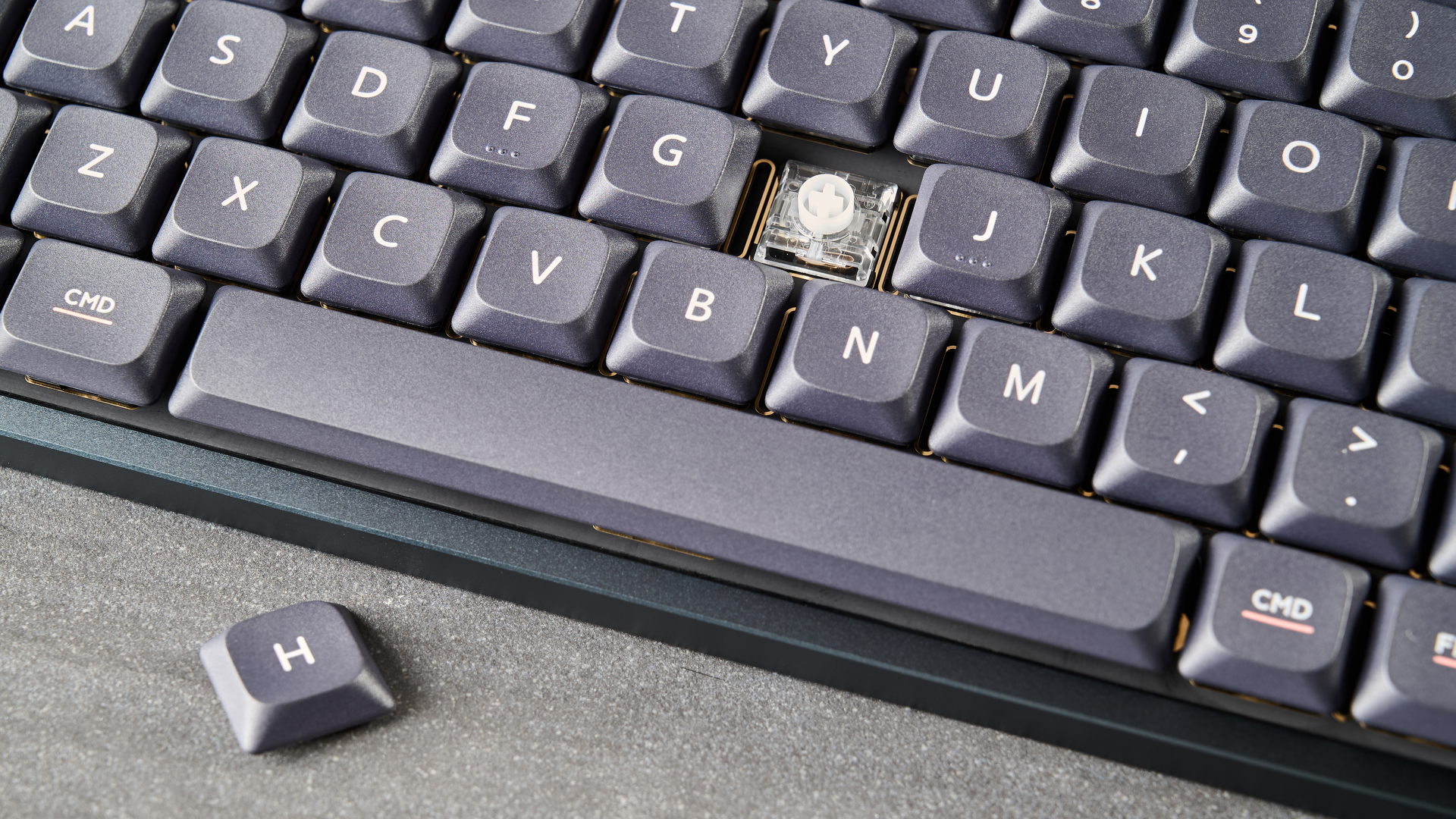 A black Iqunix Magi75 mechanical keyboard