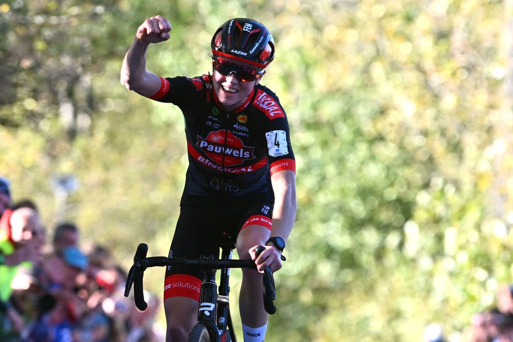 MAARKEDAL BELGIUM NOVEMBER 01 Fem Van Empel of The Netherlands and Team Pauwels Sauzen Bingoal celebrates at finish line as race winner during the 33rd Trofee Oudenaarde Koppenbergcross 2022 Womens Elite on November 01 2022 in Maarkedal Belgium Photo by Luc ClaessenGetty Images