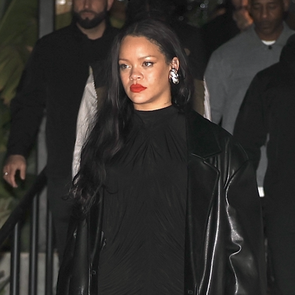 Rihanna is stylish in an all black ensemble as she and partner A$AP Rocky attend a party at Hind in West Hollywood. She wore a black dress and leather duster coat with a black alaia shoulder bag