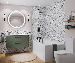 contemporary bathroom with green vanity unit and white sink