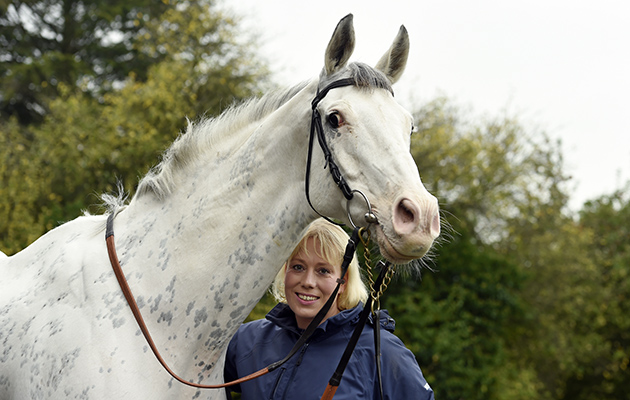 A white-coloured racehorse