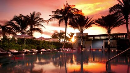 pb-tideline_ocean_resort_and_spa_pool_sunset_1.jpg