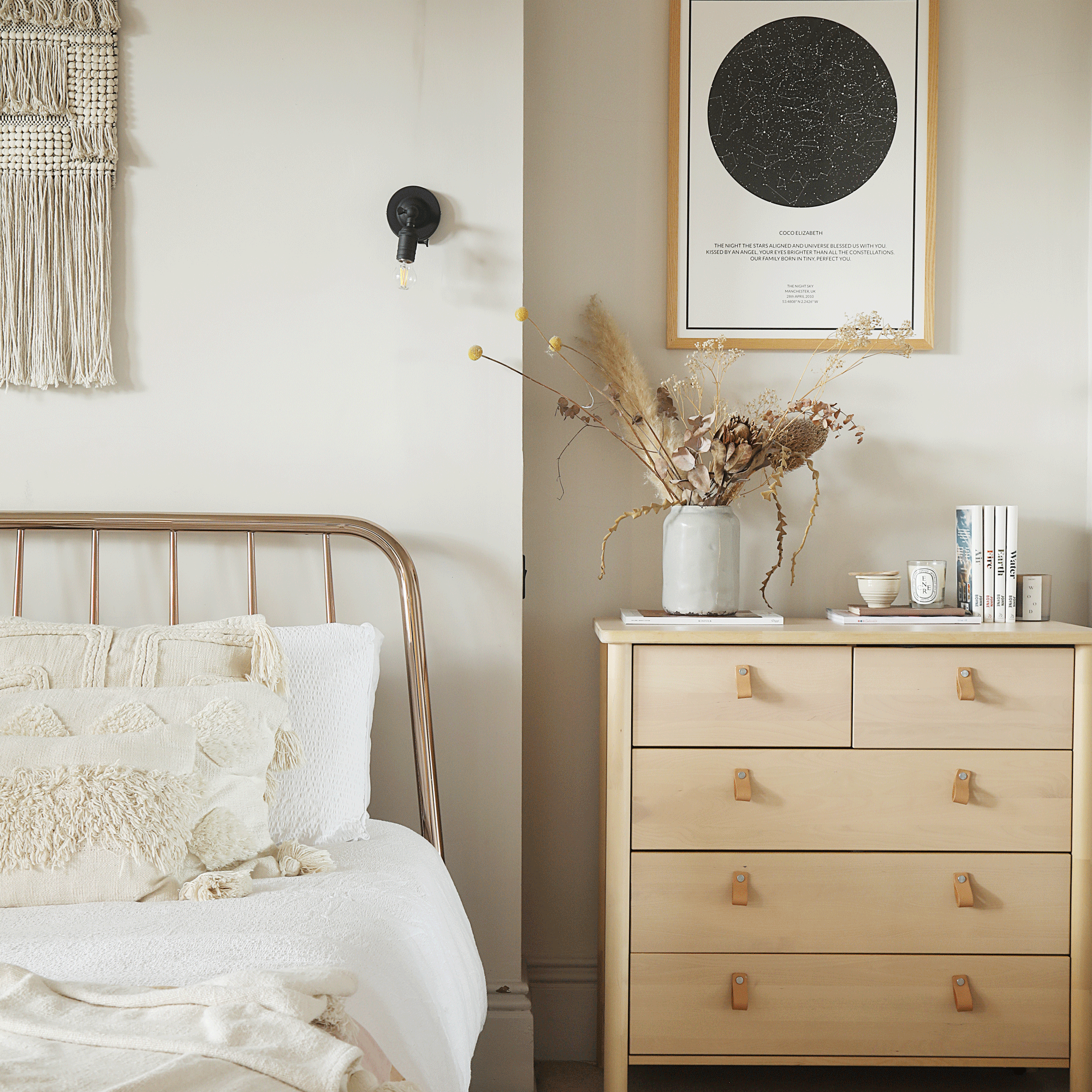 a neutral bedroom with an Ikea chest of drawers cream and white bedding