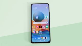 A Xiaomi Redmi Note 10 Pro from the front, with the screen on
