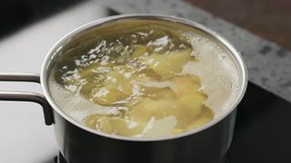 Potato water in boiling pot