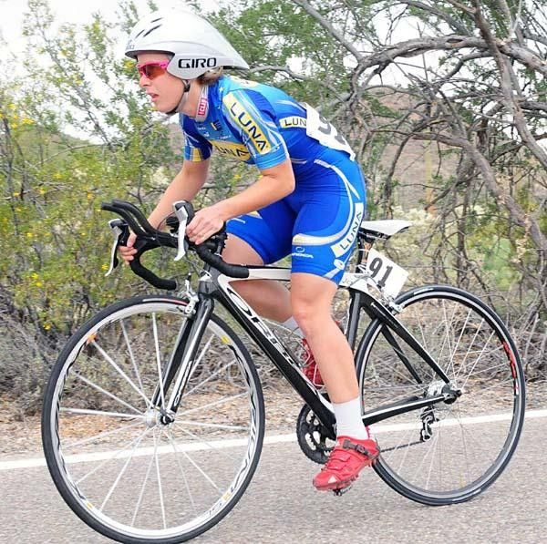 Chloe Forsman (Luna Women's MTB) builds her speed out of the saddle.