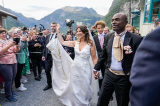 Princess Martha Louis of Norway wears a white wedding gown as she married Shaman Durek