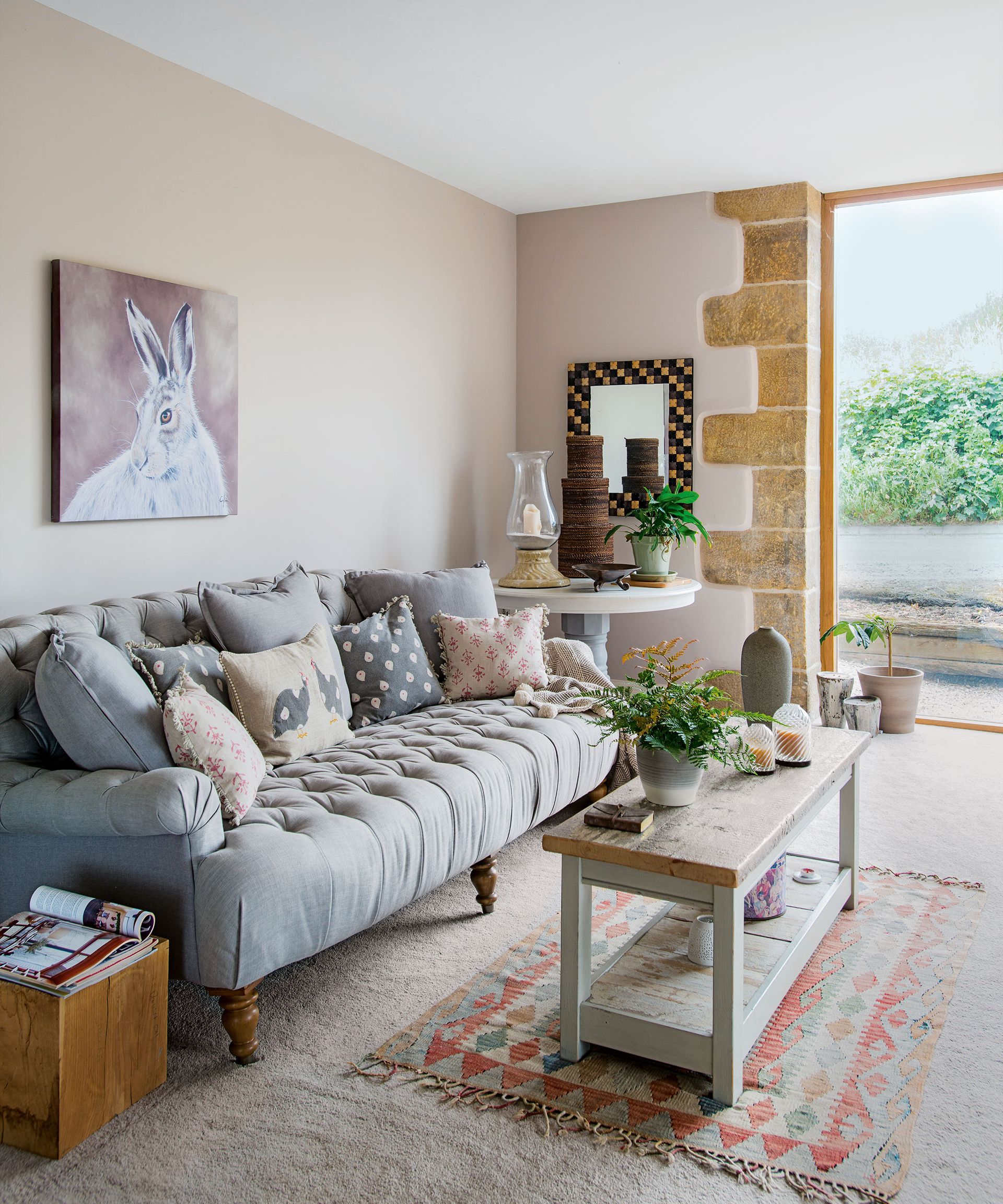 Country living room with woven carpet and cream walls