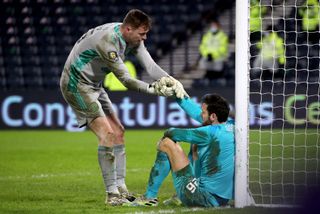 Celtic goalkeeper Conor Hazard (left) was his side's hero in the penalty shoot-out
