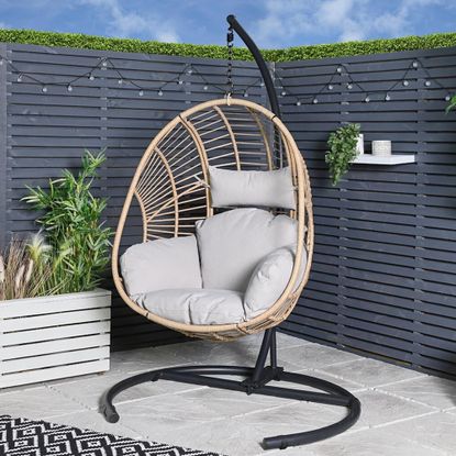 The Range Selene Hanging Egg Chair displayed in garden