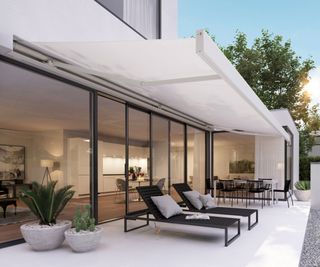 retractable patio awning and loungers