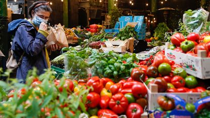 Woman at a market stall