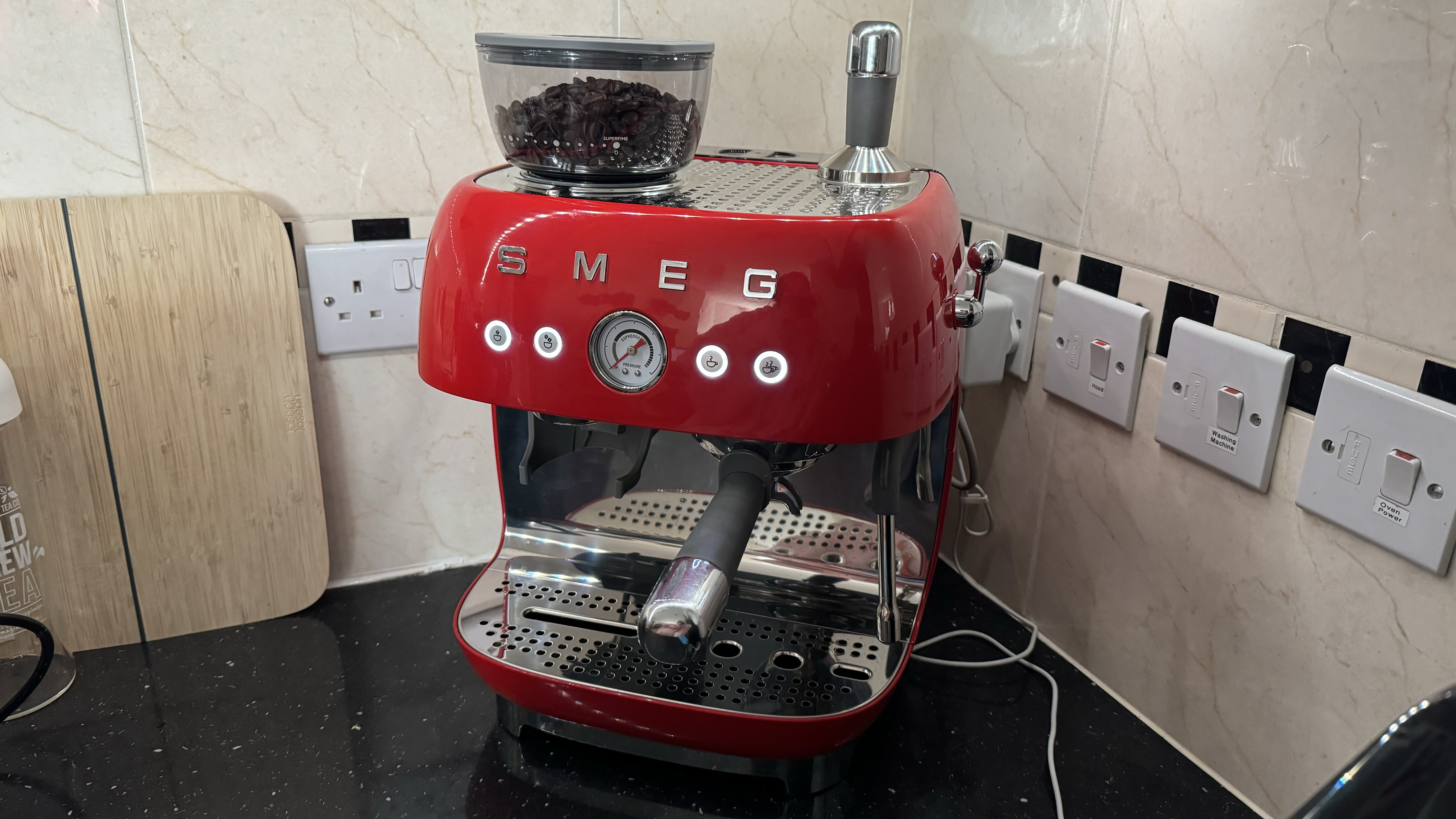 Smeg Espresso Coffee Machine EGF03 placed on a kitchen counter