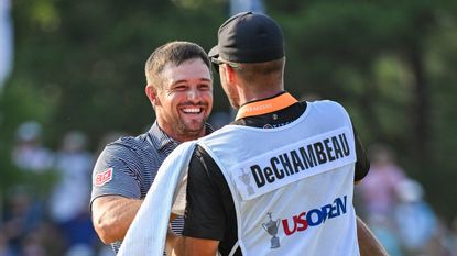 Bryson DeChambeau and his caddie celebrate his 2024 US Open win