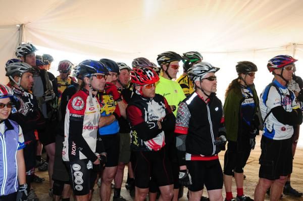 Racers eagerly await the arrival of teammates out on the course so they can go out and do a lap.