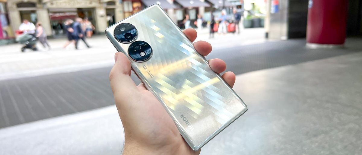 Photo of Honor 70 held in hand, viewed from rear