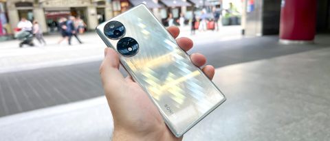 Photo of Honor 70 held in hand, viewed from rear