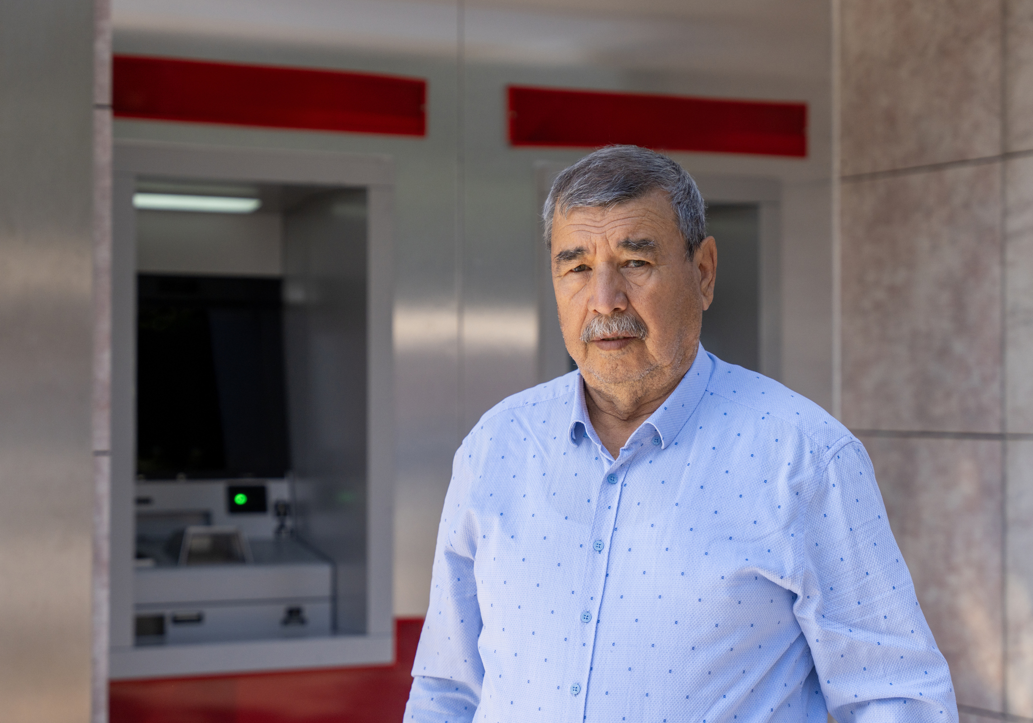 Man at a bank that's closing 