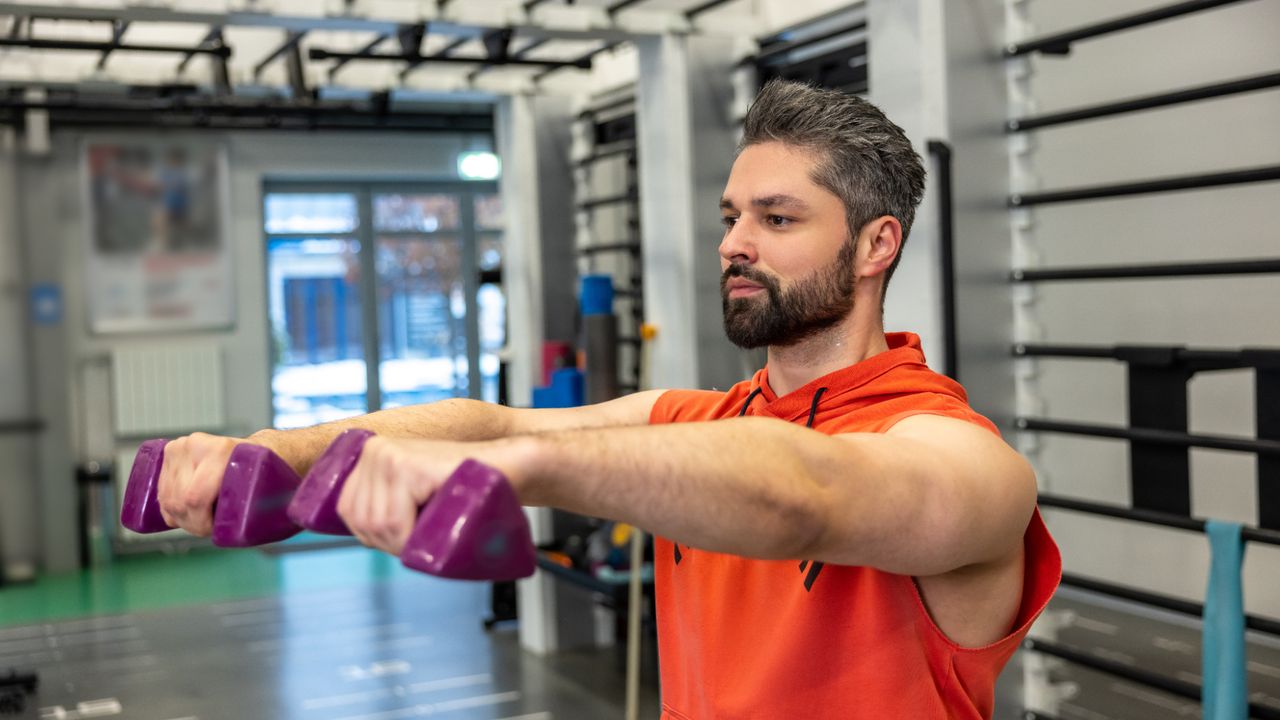 Man working out with dumbbells