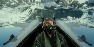 Tom Cruise as Maverick performing an over-the-top plane stunt in Top Gun: Maverick