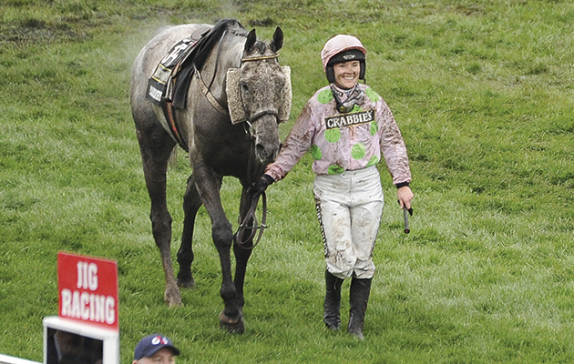 Katie Walsh keeps smiling after being unseated in the Grand National