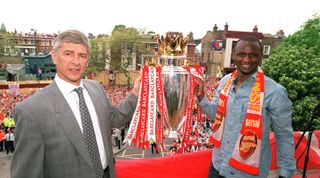 LONDON, ENGLAND - MAY 16: Arsene Wenger the Arsenal Manager and Patrick Vieira of Arsenal during the Premier League Trophy parade on May 16, 2004 in London, England. (Photo by Stuart MacFarlane/Arsenal FC via Getty Images)