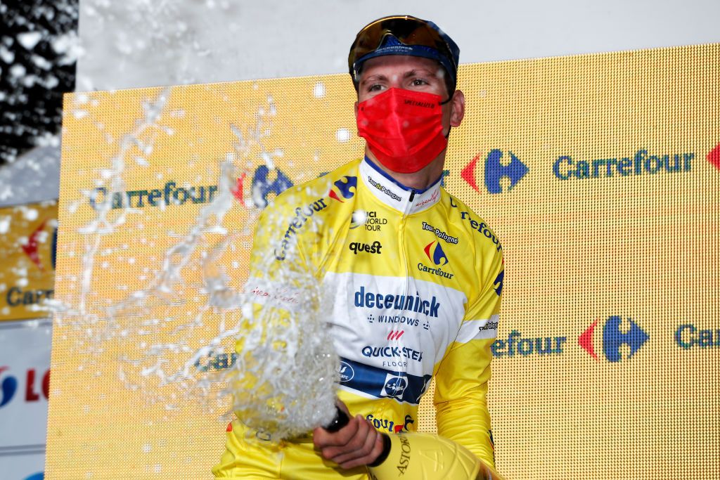 KATOWICE POLAND AUGUST 14 Joo Pedro Gonalves Almeida of Portugal and Team Deceuninck QuickStep celebrates winning the Yellow Leader Jersey on the podium ceremony after the 78th Tour de Pologne 2021 Stage 6 a 19km Individual Time Trial stage from Katowice to Katowice TourdePologne TDP2021 UCIWT on August 14 2021 in Katowice Poland Photo by Bas CzerwinskiGetty Images