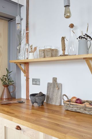 Kitchen shelving and wooden kitchen countertop