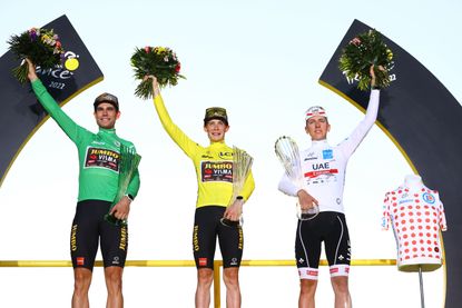 Wout van Aert, Jonas Vingegaard and Tadej Pogačar on the podium of the 2022 Tour de France