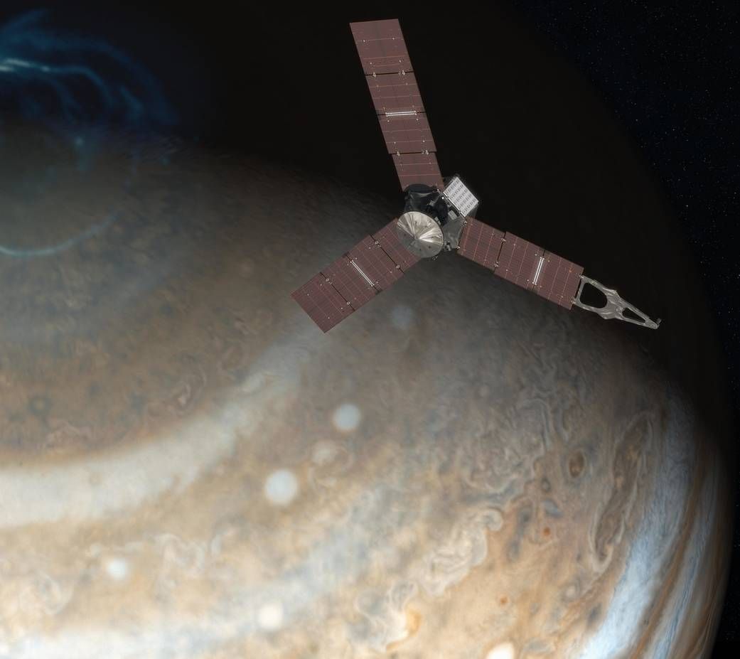 NASA&#039;s Juno spacecraft flies above Jupiter&#039;s north pole in this artist&#039;s illustration.