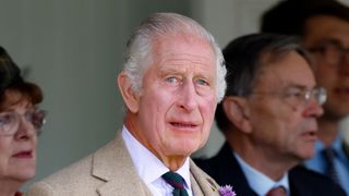 King Charles looks sad while attending The Braemar Gathering in Scotland on September 2, 2023