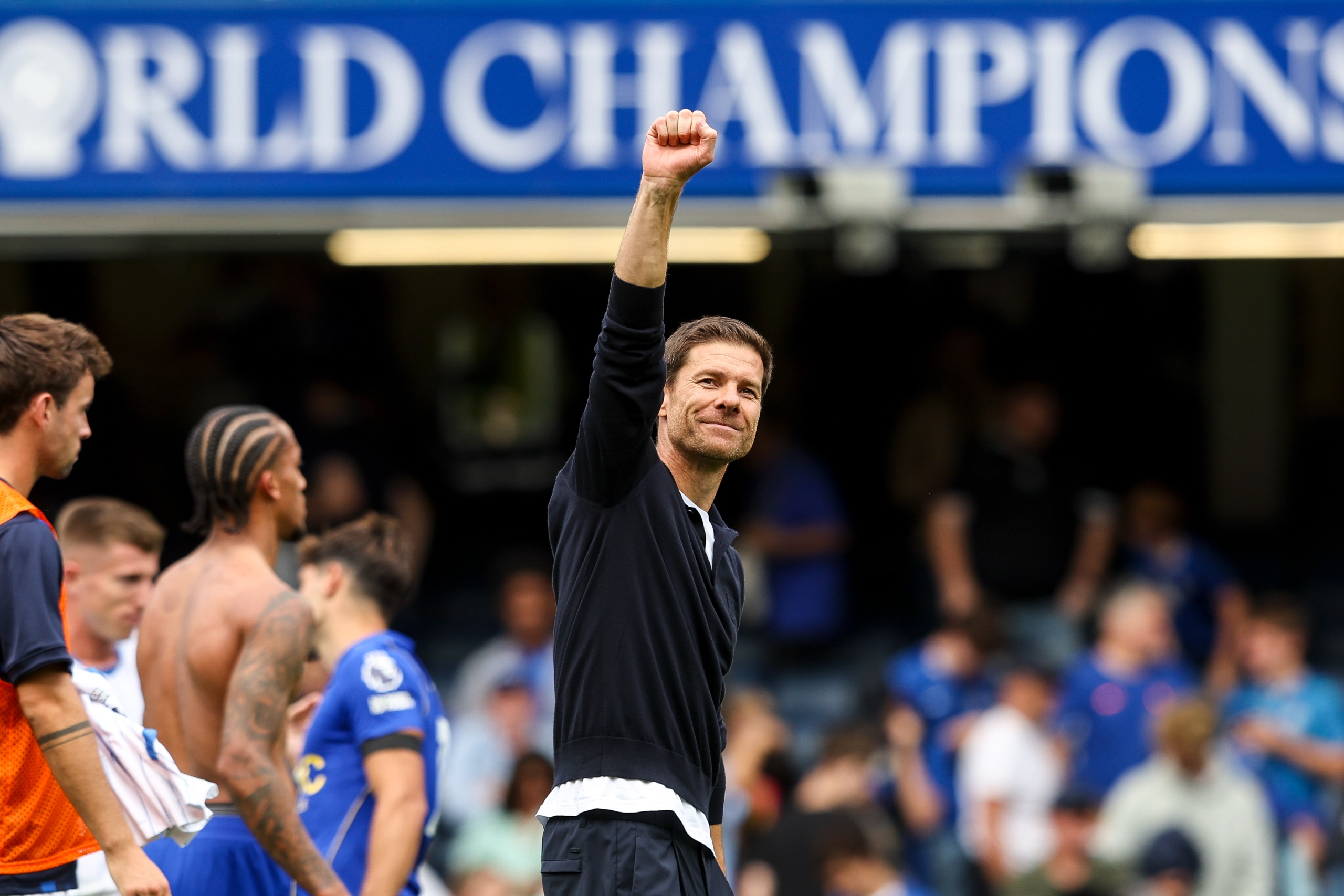 Chelsea head coach Xabi Alonso raises his fist following victory against Brighton