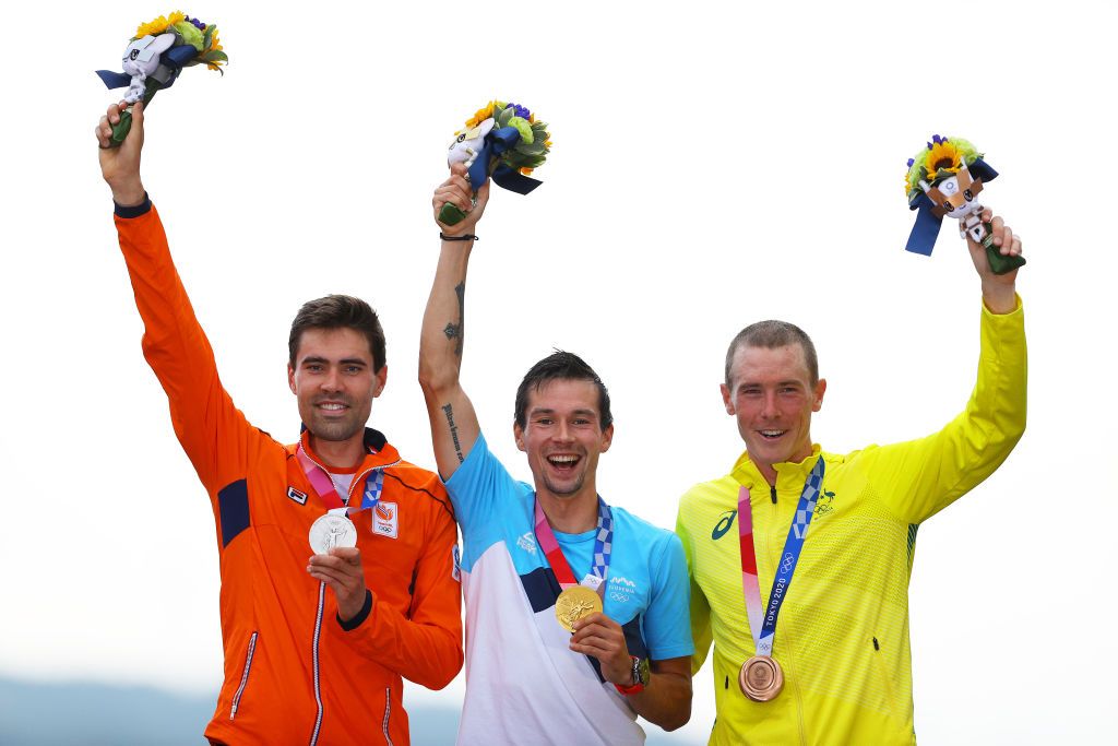 OYAMA JAPAN JULY 28 LR Silver medalist Tom Dumoulin of Team Netherlands gold medalist Primoz Roglic of Team Slovenia and bronze medalist Rohan Dennis of Team Australia pose on the podium during the medal ceremony after the Mens Individual time trial on day five of the Tokyo 2020 Olympic Games at Fuji International Speedway on July 28 2021 in Oyama Shizuoka Japan Photo by Tim de WaeleGetty Images