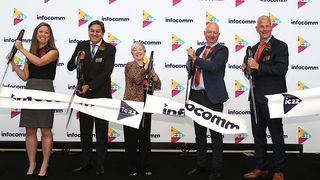 AVIXA cuts the ribbon to open InfoComm 2022 in Las Vegas.