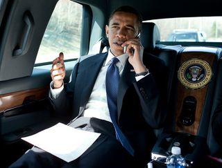 President Barack Obama speaks on an unidentified flip phone in the presidential limousine in northern Virginia in March 2010. Credit: Pete Souza/White House