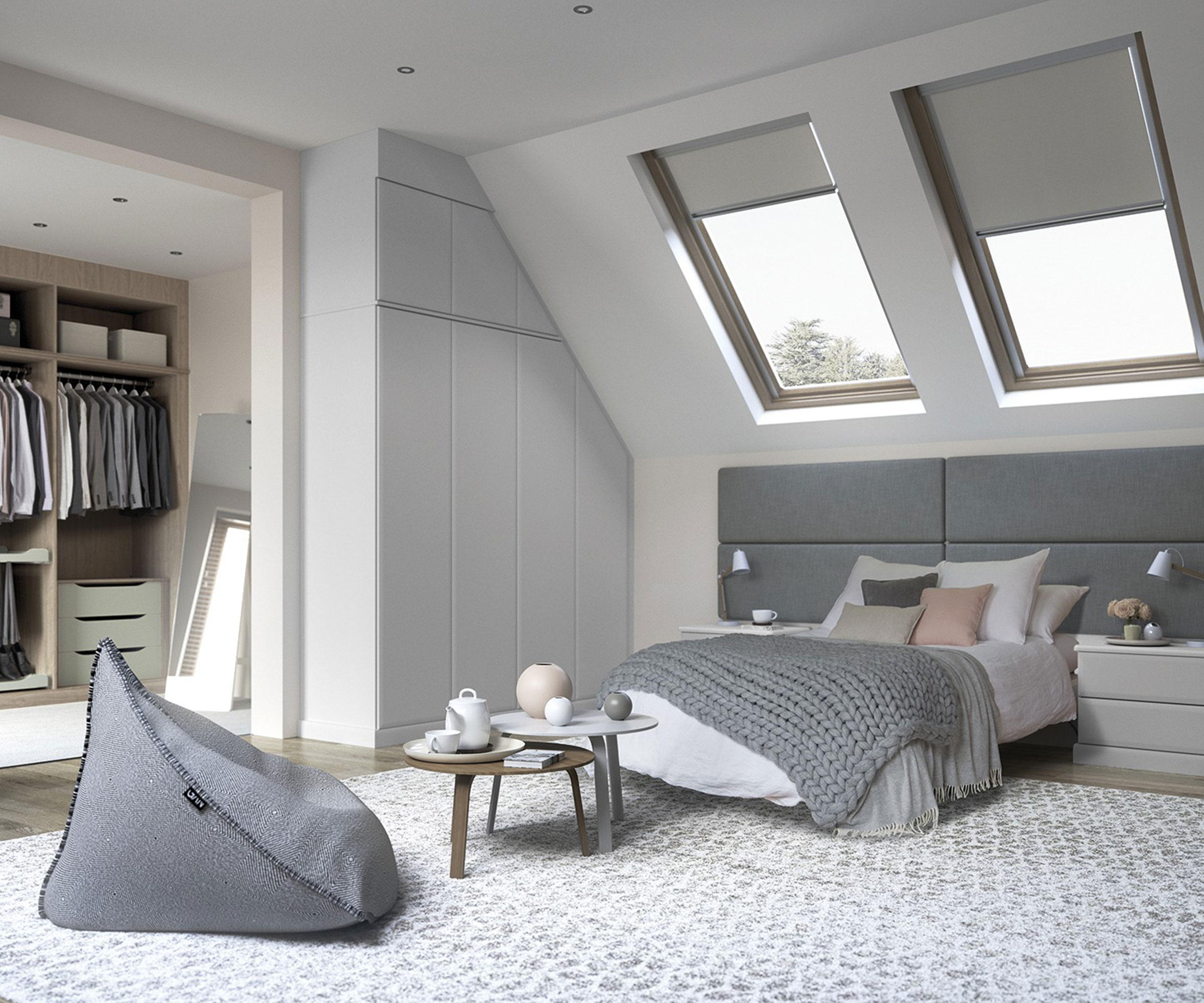 grey and white loft conversion bedroom with fitted wardrobes