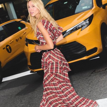 Woman in a plaid dress