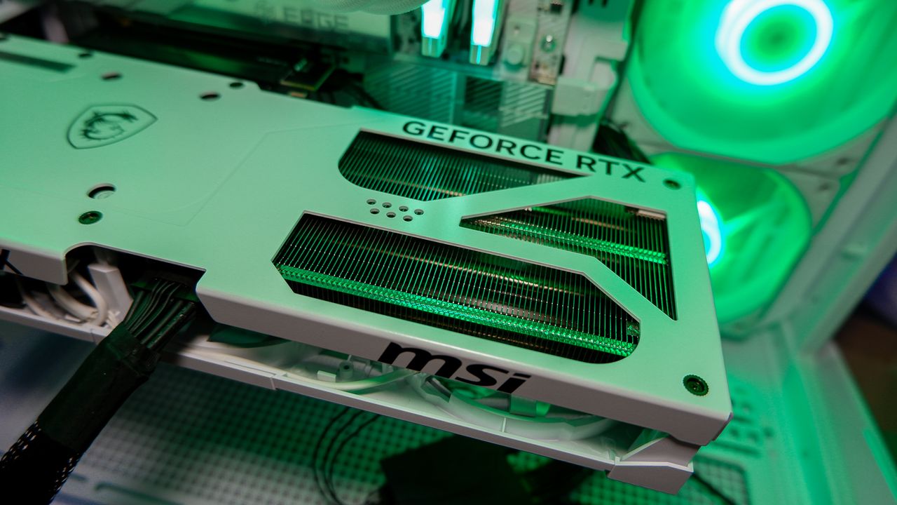 An MSI RTX 5080 in white installed in a gaming PC.