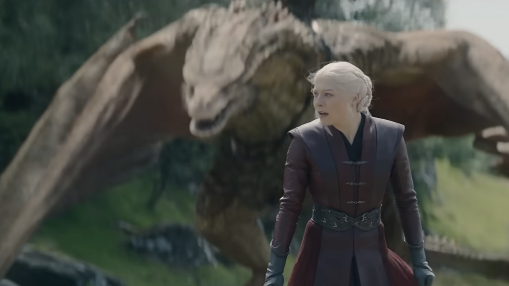 Rhaenyra with Syrax in the background.