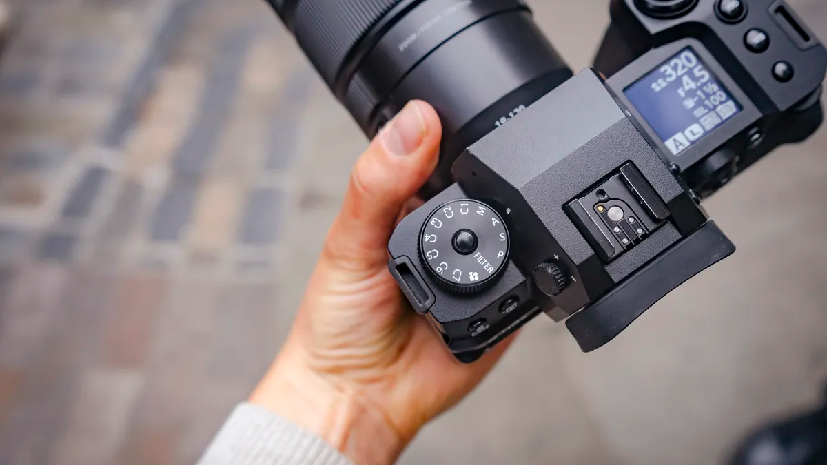 Someone holding the Fujifilm X-H2S