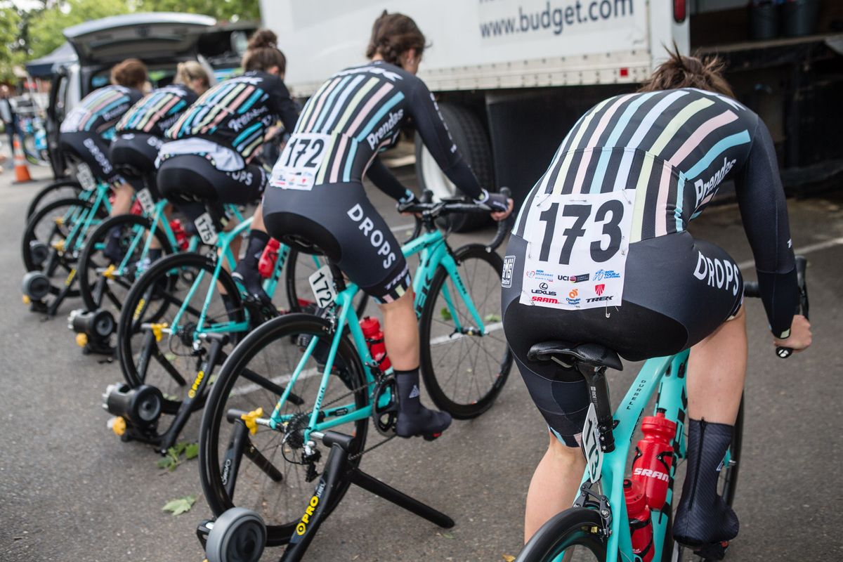 The Drops Cycling Team warms up on the trainers
