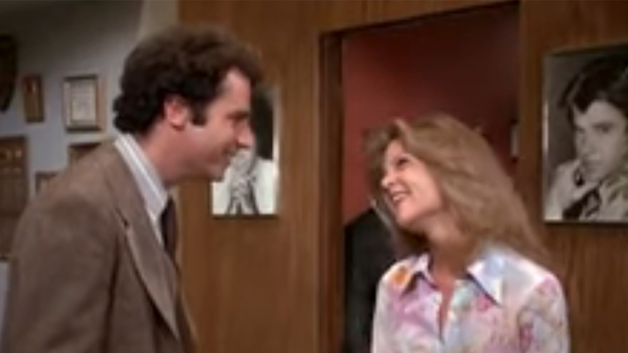 Two cast members talking to each other on Tabitha