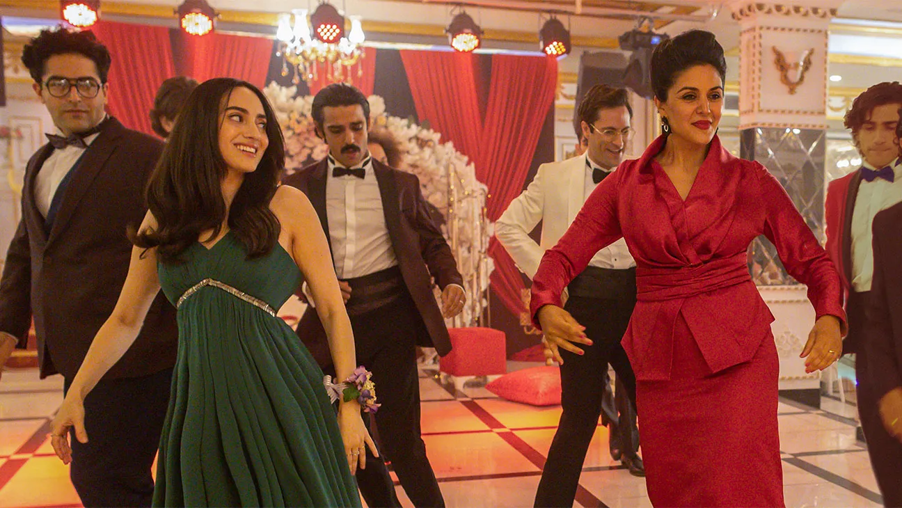 a family dances on the dance floor at a persian wedding in the movie persian version
