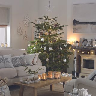 Living room with Christmas decor in white room/
