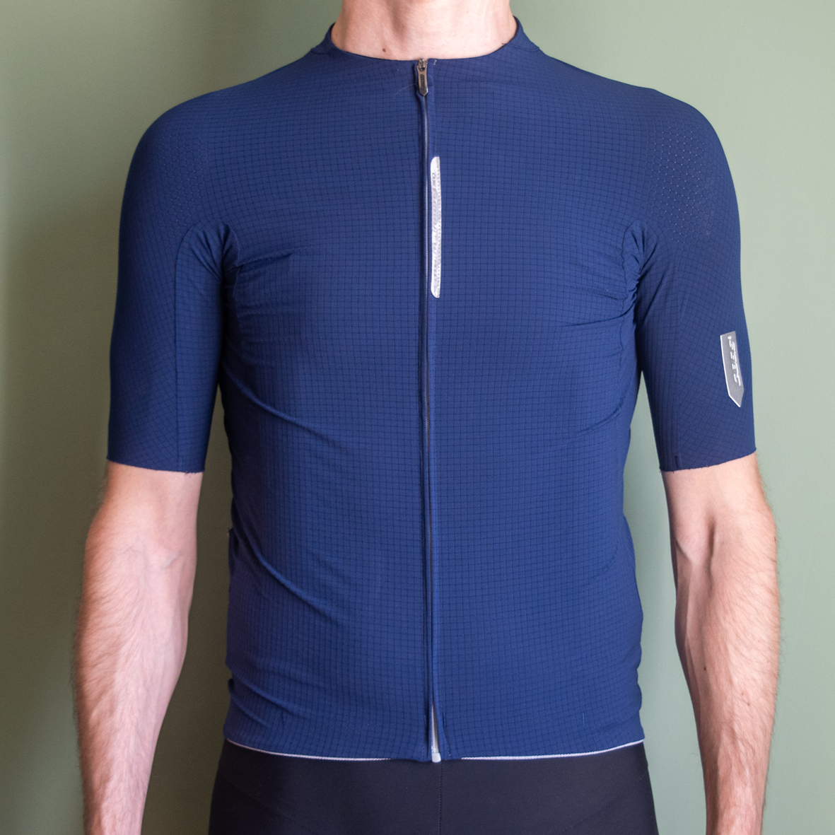 Q36.5 Dottore Pro jersey being worn against a green background